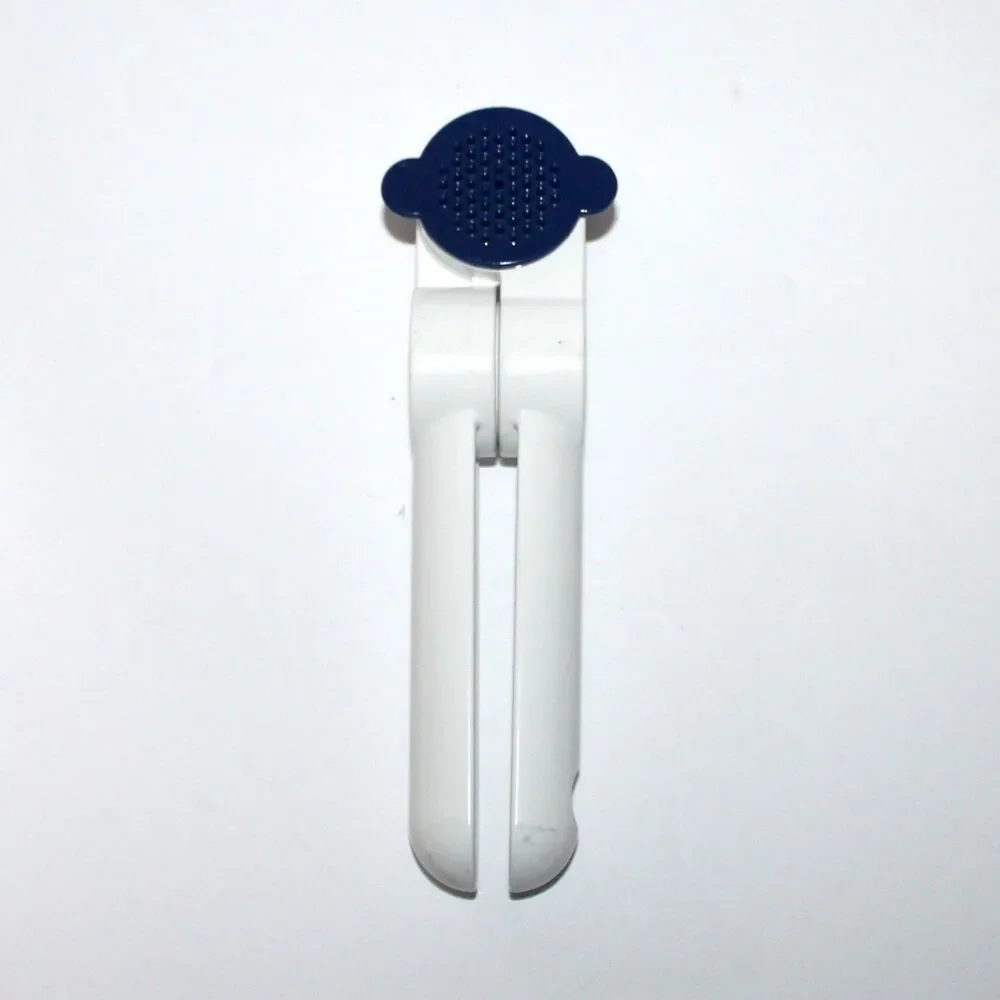 Tupperware Garlic Press with blue cleaning tool metal enamel white retro